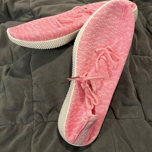 Woman’s pink runners